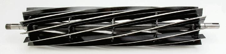 A close up of some black sticks on a white surface